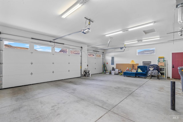 60 Appleford Ct, Asotin, WA 99402 - garage with a garage door opener and electric panel
