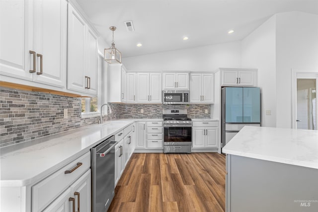 60 Appleford Ct, Asotin, WA 99402 - kitchen featuring appliances with stainless steel finishes, a sink, dark wood finished floors, white cabinets, and recessed lighting