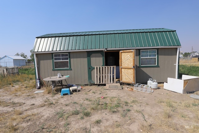 exterior space with an outbuilding