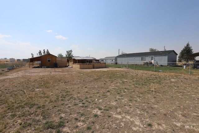 view of yard with an outdoor structure