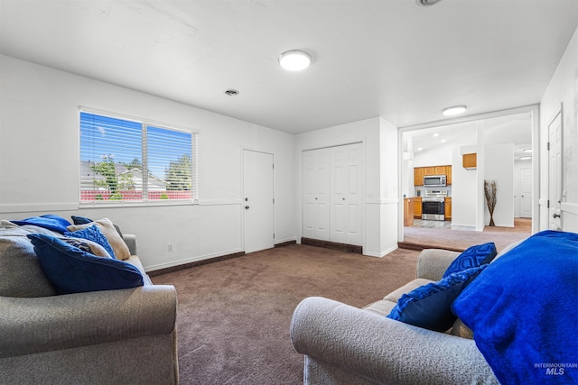 7842 Arlington Dr, Nampa, ID 83687 - living room featuring carpet flooring