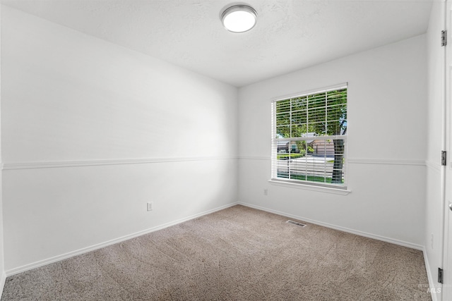 7842 Arlington Dr, Nampa, ID 83687 - spare room with carpet floors and baseboards
