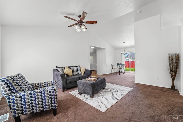 7842 Arlington Dr, Nampa, ID 83687 - carpeted living area with a chandelier, a ceiling fan, vaulted ceiling, and baseboards