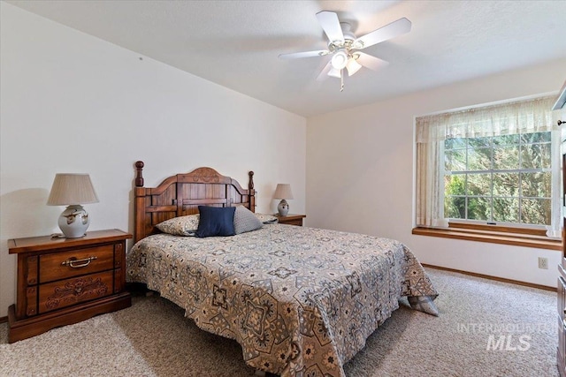 3428 N Columbine Ave, Boise, ID 83713 - carpeted bedroom featuring baseboards and a ceiling fan