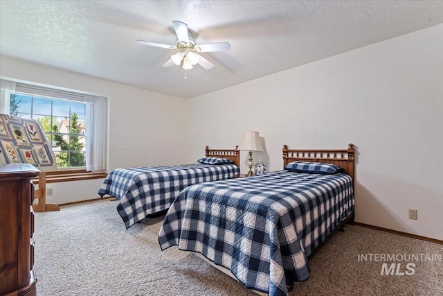 3428 N Columbine Ave, Boise, ID 83713 - carpeted bedroom featuring baseboards, a textured ceiling, and ceiling fan