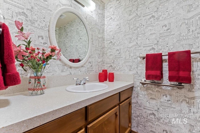 3428 N Columbine Ave, Boise, ID 83713 - bathroom with vanity and wallpapered walls