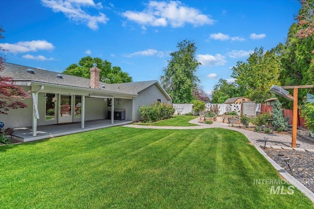 3428 N Columbine Ave, Boise, ID 83713 - view of yard with a deck, a shed, central AC, and a patio area