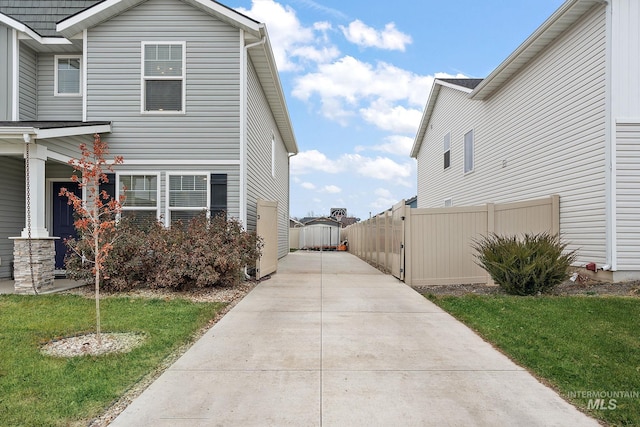 view of property exterior featuring a yard