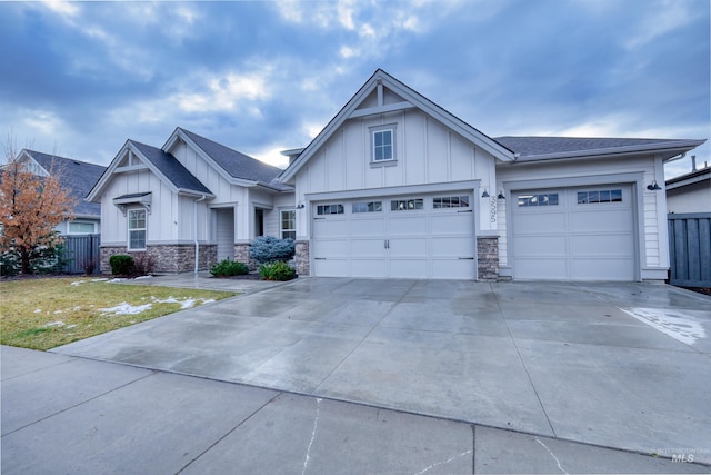 view of front of home featuring a garage and a front yard