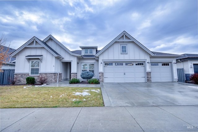 view of front facade with a front lawn and a garage