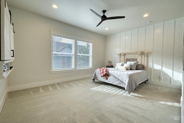 carpeted bedroom featuring ceiling fan