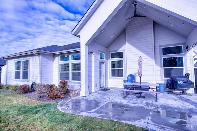 rear view of property featuring a patio