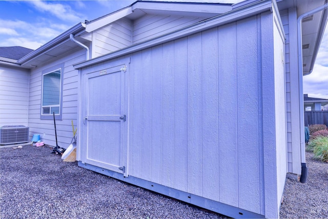 view of side of home featuring central air condition unit