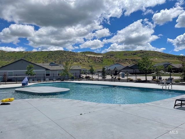 5207 W Kloe Ct Unit 808, Boise, ID 83714 - community pool featuring a mountain view and a patio area