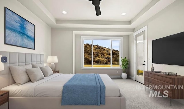 5207 W Kloe Ct Unit 808, Boise, ID 83714 - carpeted bedroom featuring a tray ceiling, a ceiling fan, and recessed lighting