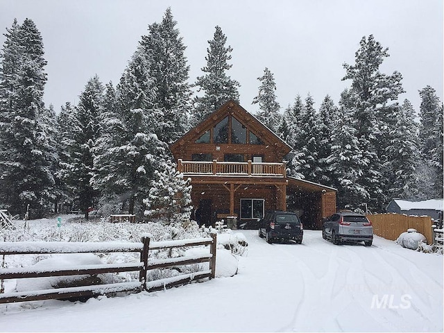 view of log cabin