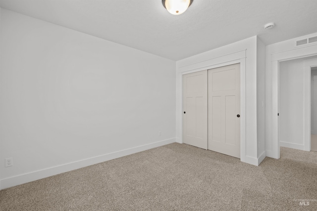 5687 S Snowden Ave, Meridian, ID 83642 - unfurnished bedroom with visible vents, baseboards, carpet, and a closet