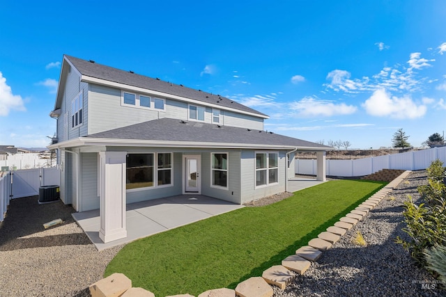 5687 S Snowden Ave, Meridian, ID 83642 - rear view of house with a patio area, a lawn, a fenced backyard, and a gate