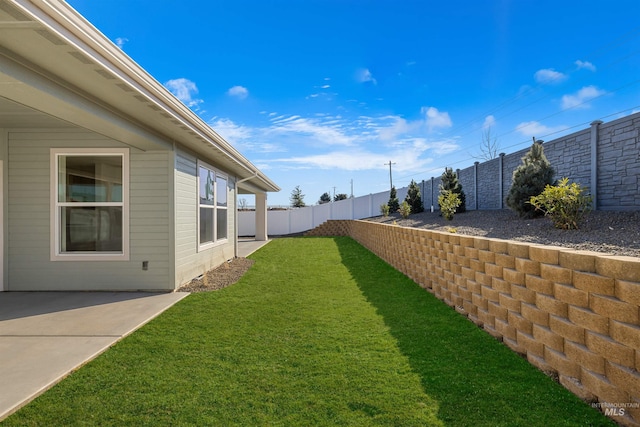 5687 S Snowden Ave, Meridian, ID 83642 - view of yard featuring a fenced backyard and a patio area