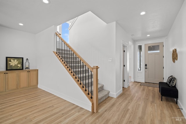 5687 S Snowden Ave, Meridian, ID 83642 - entrance foyer featuring stairs, recessed lighting, light wood-type flooring, and baseboards