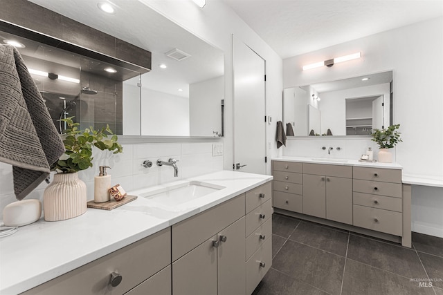 4135 N Hawkeye Pl, Boise, ID 83703 - full bath with two vanities, tile patterned flooring, tasteful backsplash, a tile shower, and recessed lighting