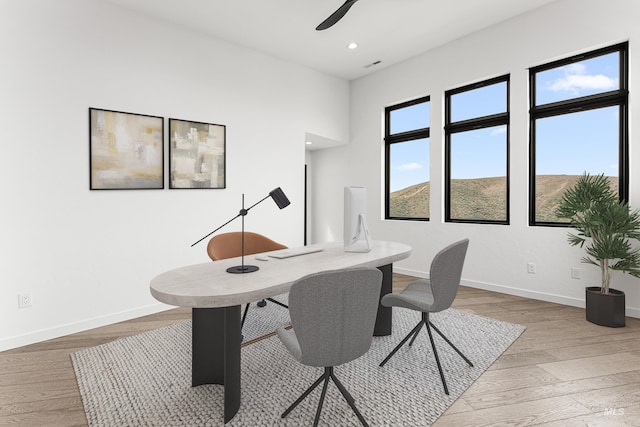 4135 N Hawkeye Pl, Boise, ID 83703 - office with light wood-style flooring, baseboards, ceiling fan, and recessed lighting