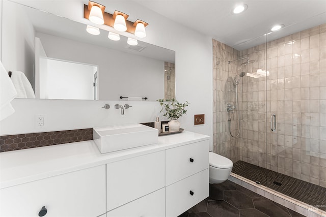 4135 N Hawkeye Pl, Boise, ID 83703 - bathroom featuring toilet, a stall shower, vanity, recessed lighting, and tile patterned floors