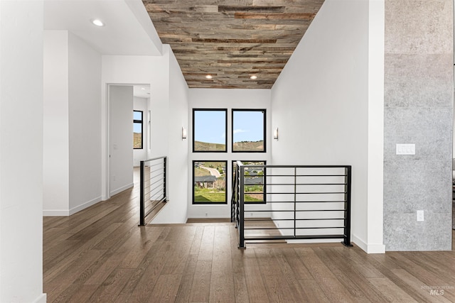 4135 N Hawkeye Pl, Boise, ID 83703 - empty room with hardwood / wood-style flooring, wooden ceiling, baseboards, and recessed lighting