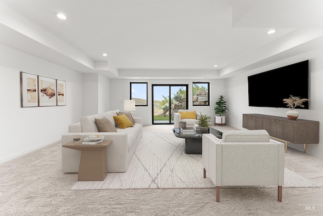 4135 N Hawkeye Pl, Boise, ID 83703 - living room with light colored carpet, recessed lighting, a raised ceiling, and baseboards