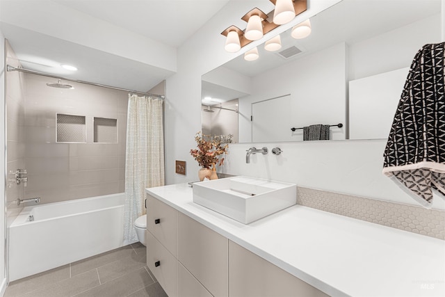 4135 N Hawkeye Pl, Boise, ID 83703 - full bathroom featuring shower / bathtub combination with curtain, vanity, tile patterned floors, and toilet