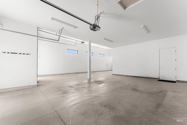 4135 N Hawkeye Pl, Boise, ID 83703 - garage featuring a garage door opener and baseboards