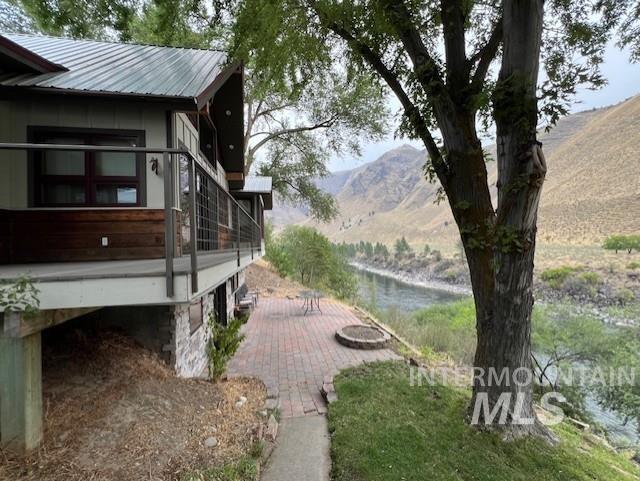 view of home's exterior with a mountain view