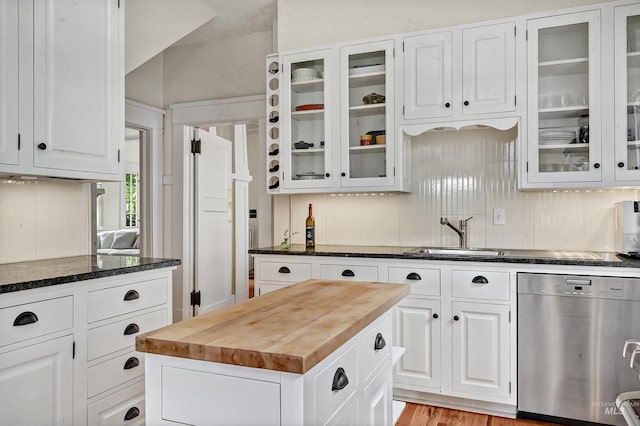 1707 W Resseguie St, Boise, ID 83702 - kitchen with dishwasher, butcher block countertops, white cabinets, and glass insert cabinets