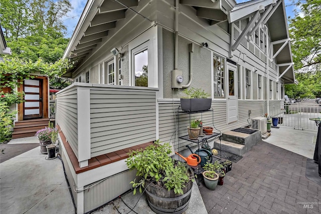 1707 W Resseguie St, Boise, ID 83702 - view of side of home featuring a patio area