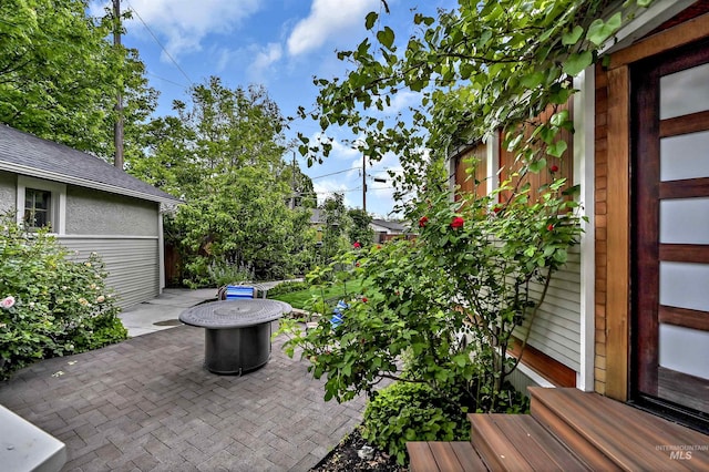 1707 W Resseguie St, Boise, ID 83702 - view of patio featuring a fire pit