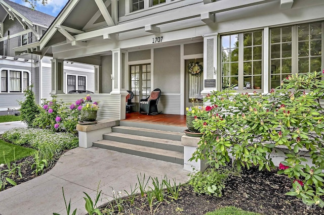 1707 W Resseguie St, Boise, ID 83702 - property entrance featuring a porch and stucco siding