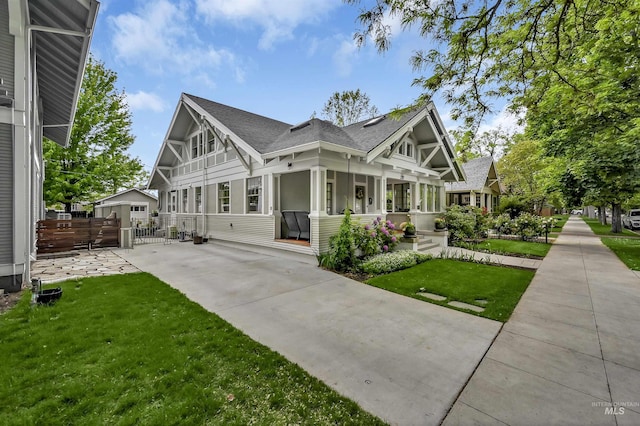 1707 W Resseguie St, Boise, ID 83702 - view of home's exterior with a gate and a shingled roof