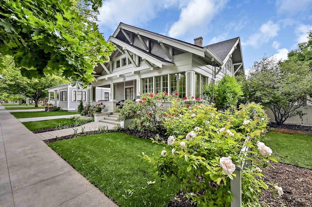 1707 W Resseguie St, Boise, ID 83702 - view of front of home featuring a chimney and a front lawn