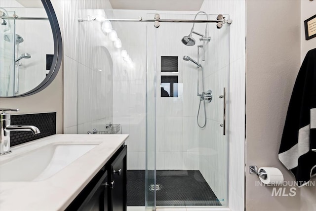 476 E Thurman Mill St, Garden City, ID 83714 - full bathroom featuring a shower stall and vanity