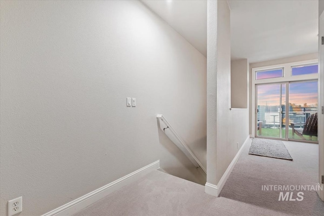 476 E Thurman Mill St, Garden City, ID 83714 - stairs with baseboards and carpet floors