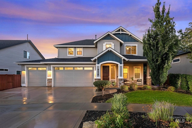 craftsman-style house with covered porch and a garage