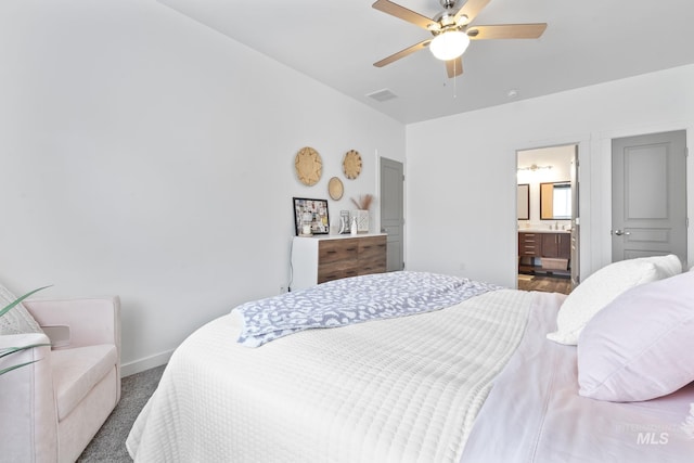 2114 W Claira Rd, Nampa, ID 83651 - bedroom with a ceiling fan, carpet floors, visible vents, baseboards, and ensuite bath