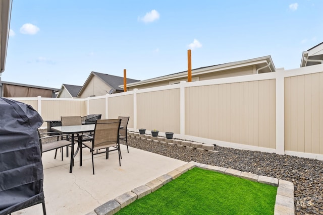 2114 W Claira Rd, Nampa, ID 83651 - view of patio / terrace with outdoor dining space and a fenced backyard