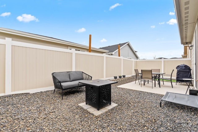 2114 W Claira Rd, Nampa, ID 83651 - view of patio with a grill, an outdoor fire pit, and a fenced backyard