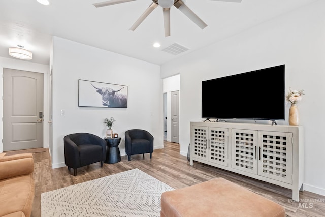 2114 W Claira Rd, Nampa, ID 83651 - living room with wood finished floors, visible vents, baseboards, ceiling fan, and recessed lighting