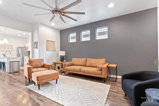 2114 W Claira Rd, Nampa, ID 83651 - living area with light wood-style flooring, a ceiling fan, and recessed lighting