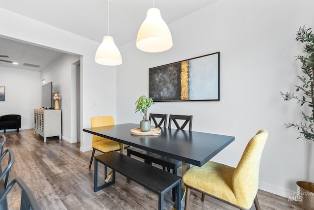 2114 W Claira Rd, Nampa, ID 83651 - dining room with visible vents, wood finished floors, and baseboards