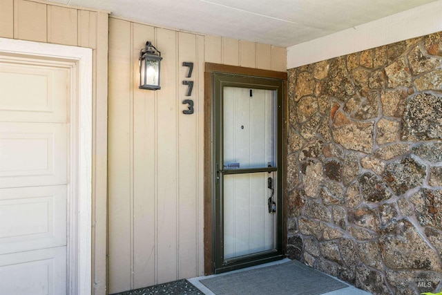 773 Monroe St, Twin Falls, ID 83301 - view of exterior entry with stone siding and board and batten siding