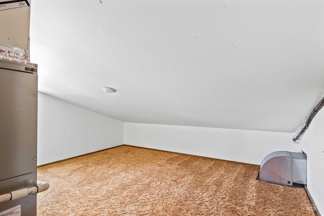 773 Monroe St, Twin Falls, ID 83301 - bonus room featuring carpet flooring, lofted ceiling, and baseboards