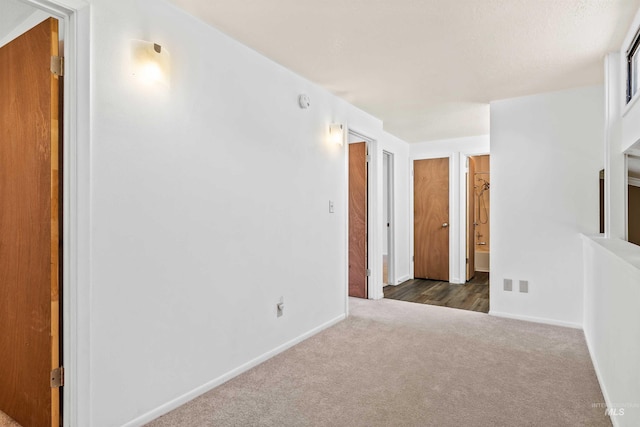773 Monroe St, Twin Falls, ID 83301 - unfurnished room featuring dark colored carpet and baseboards